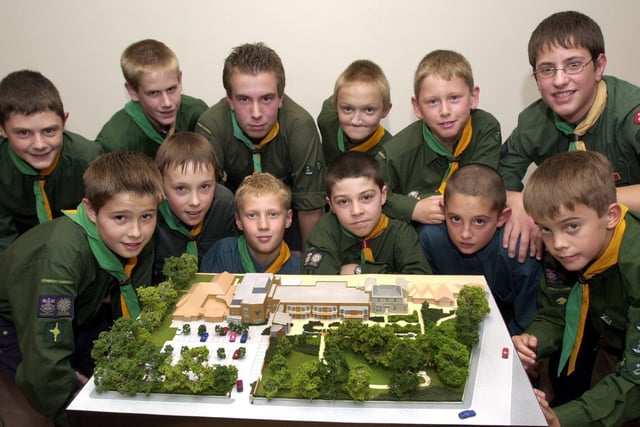 Scouts from the 6th Morley pack visited St. Gemma's Hospice in October 2001. 
 They are pictured with a model of how the new look hospice will look.