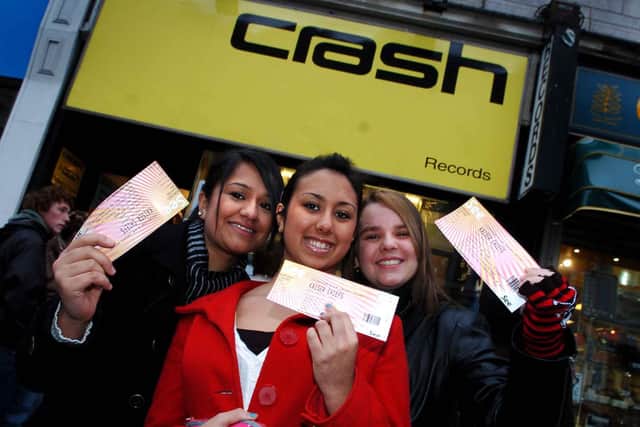 People queue for the Kaiser chief gig tickets outside Crash Records in 2007. Pictured: 16-year-old Lucy Beggs, Harjinder Bacchus and Nadia Ward with their tickets. Photo: Matthew Page