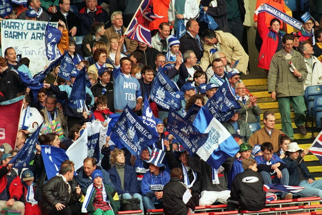Another territic photo of Whitby Town's fans celebrate winning the FA Vase after their team beat North Ferriby United 3-0 at Wembley in May 1997.