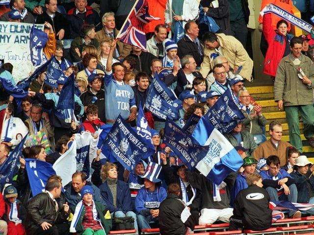 Another territic photo of Whitby Town's fans celebrate winning the FA Vase after their team beat North Ferriby United 3-0 at Wembley in May 1997.