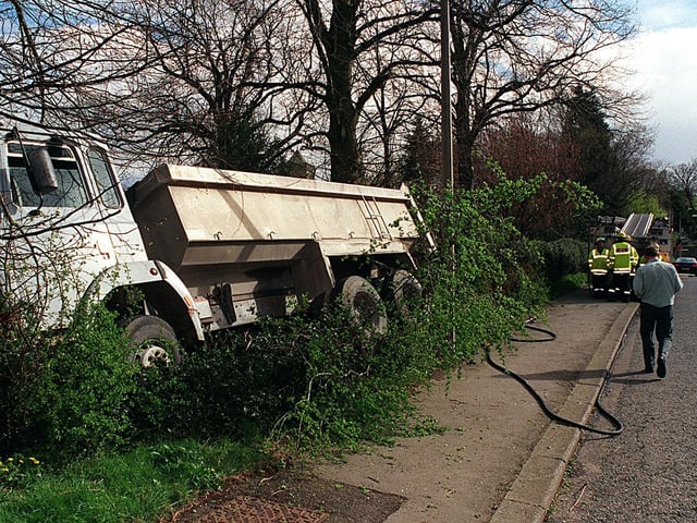 The driver of this lorry managed to stop his vehicle by steering it into a tree as he approached Sleights near Whitby down Blue Bank in April 1999. He escaped with a cut finger as the load of hardcore, intended for roadworks in the village just yards further on, partially slipped from the wagon and spilled out onto land on the road side.
