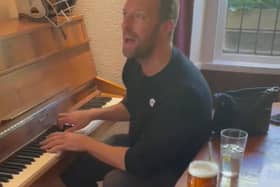 Chris Martin plays the pub piano for lucky drinkers. PIC: Chris Parkin/PA Wire