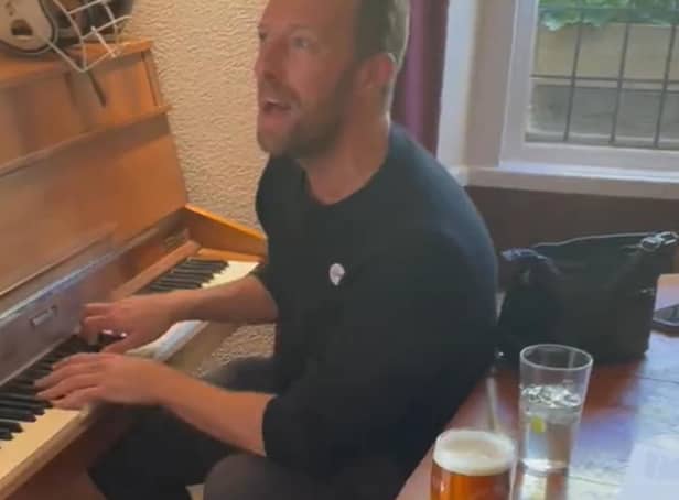 Chris Martin plays the pub piano for lucky drinkers. PIC: Chris Parkin/PA Wire