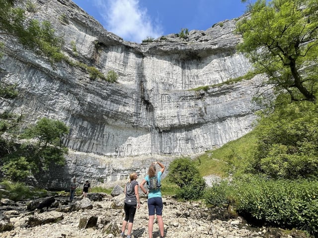 Malham Cove, North Yorkshire
The tourist attraction, in Malham, is a huge curving amphitheatre-shaped cliff formation made up of limestone rock. It is a well-known beauty spot and a popular place to visit