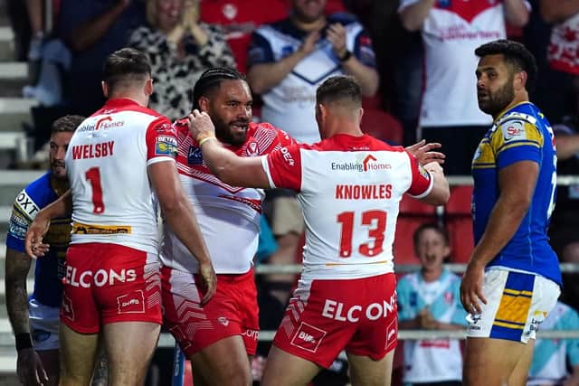 St Helens' Konrad Hurrell (second left) celebrates scoring his side's fourth try against his former club Leeds Rhinos last time out. Picture: Martin Rickett/PA Wire.