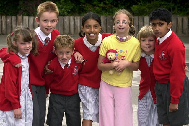 Eve McGuire was welcomed by Froebelian pupils when she visited the school to receive money which had been raised for her operation in New York. She is pictured with pupils, from left, Rebecca Hutson, Fraser Rumble, Jack Smith, Alysia Patel, Elizabeth Pike and Rohan Misra.