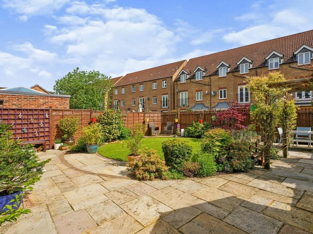 To the rear of the property the garden gives you a little bit of everything, including a small decking area to the left of the enclosed garden perfect for catching the afternoon sun and the patio area surrounding the low maintained circle lawn, plants and flower beds.