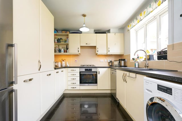 The property is fitted with an exquisite kitchen with matching wall and base units, and complimentary work surfaces over the sink and draining area.