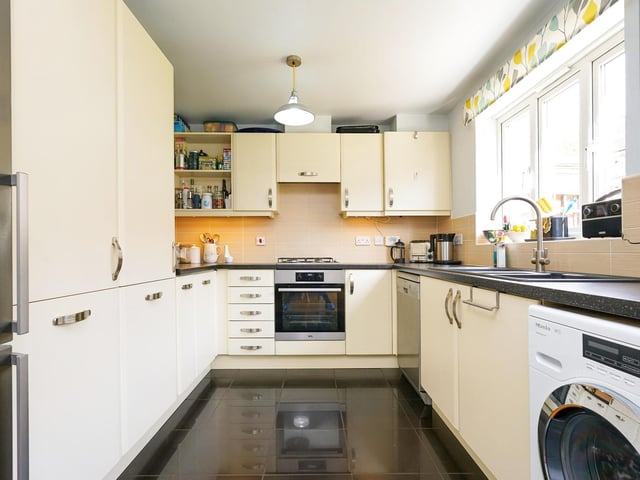 The property is fitted with an exquisite kitchen with matching wall and base units, and complimentary work surfaces over the sink and draining area.