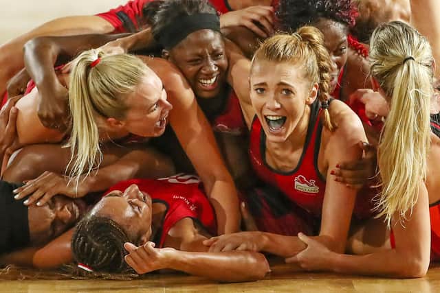 Helen Housby, right, who scored in the final second, and her England team-mates celebrate after beating Australia and winning the gold medal at the last Commonwealth Games. Picture:  Scott Barbour/Getty Images.