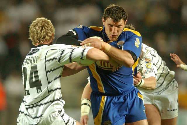 Barrie McDermott terrorises the Hull defence during his Rhinos heyday, in 2004. Picture by Steve Riding.