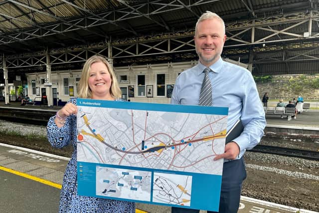 Neil Holm with Hannah Lomas, the principal programme sponsor at Huddersfield station.