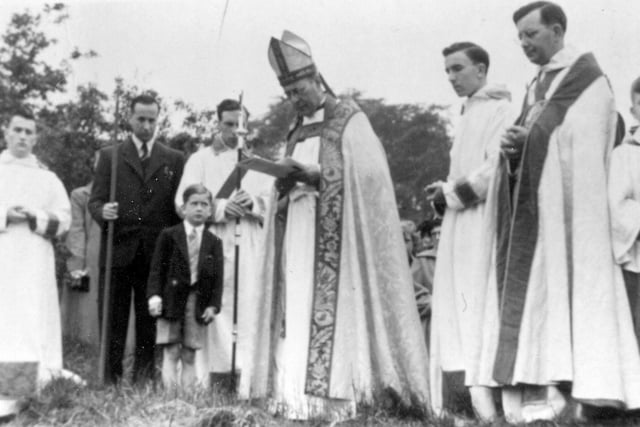 June 1953 and church officials, including the Bishop of Ripon (centre) are pictured at a ceremony in which the site of an old quarry behind St. James' Church was presented to the church for use by St. James' School as a playing field. The land had been bought by Ralph Horsfall, a former pupil of the school, and given to them for this purpose.