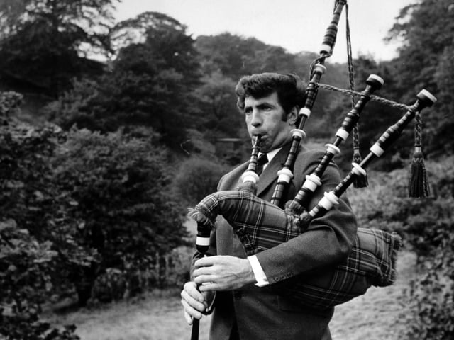 City of Leeds Pipe Band members John Teggait plays the pipes in Dean Woods near his home in October 1971. He had tried practising at home. "The noise nearly raised the roof," said his wife Eileen.