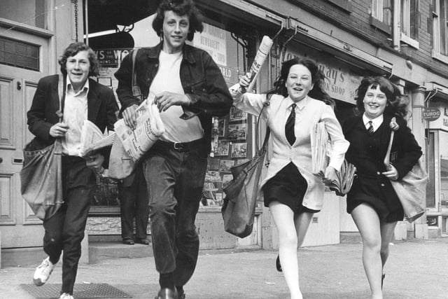Youngsters are pictured leaving Fred Gaines's shop in Cross Gates ton start their newspaper rounds in May 1971. They are, from left, Terence McQueenie, David Wainwright, Diana Oldroyd and Gillian Brammer.