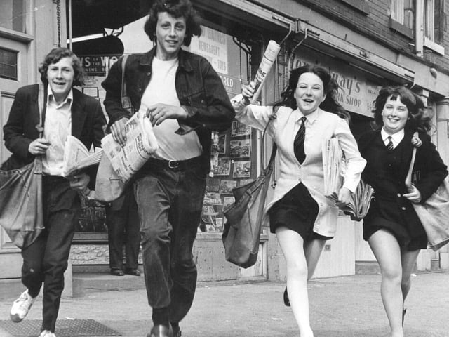 Youngsters are pictured leaving Fred Gaines's shop in Cross Gates ton start their newspaper rounds in May 1971. They are, from left, Terence McQueenie, David Wainwright, Diana Oldroyd and Gillian Brammer.