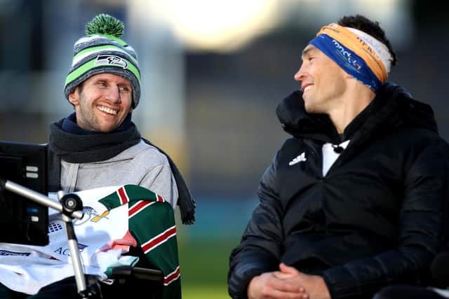 Former teammates Rob Burrow and Kevin Sinfield share a smile. PIC: Getty