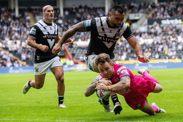 Richie Myler scores a try against

Hull FC. Picture: Bruce Rollinson.