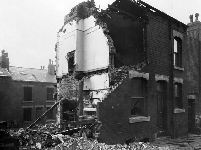 Fulham Street showing interior of a partly demolished house pictured in April 1941.