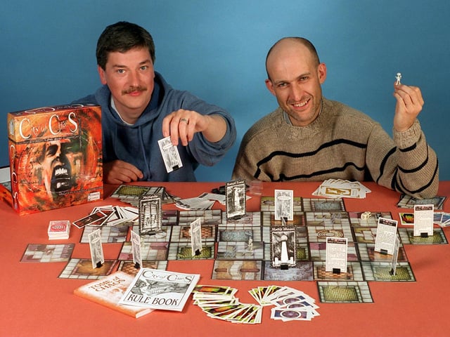 Entrepreneurs Martyn Oliver packed in their jobs to start a board game company. They are pictured with their board game City of Chaos.