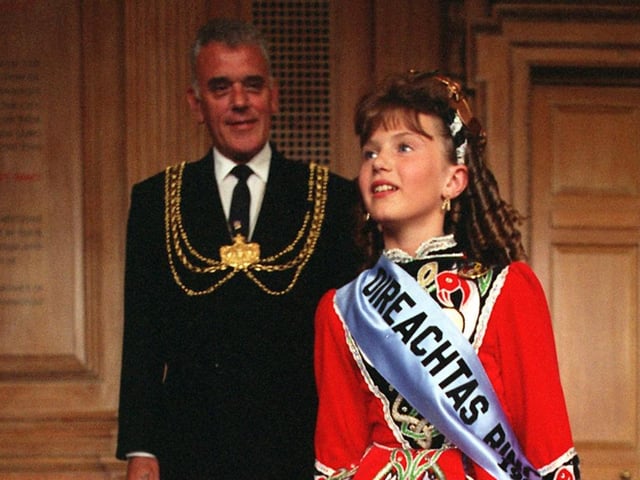 The Lord Mayor of Leeds Coun Malcolm Bedford watches on as World Champion Irish Dancer Sinead Fallon from Leeds performs at the Civic Hall.