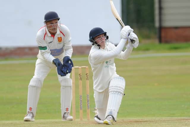 Joe Harrison of Adel hits four runs against Pool. Picture: Steve Riding.