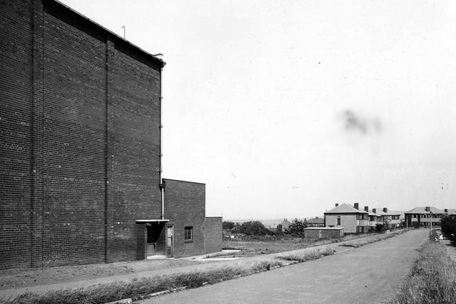 Southleigh Crescent in July 1945. The large, brick building in the foreground, is the side of the Rex cinema which fronts onto Gypsy Lane.