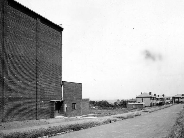 Southleigh Crescent in July 1945. The large, brick building in the foreground, is the side of the Rex cinema which fronts onto Gypsy Lane.