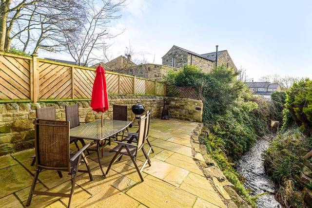 The real show stopper of this property is the wonderful outdoor space, with the stunning landscaped garden featuring a private bridge which goes over the village stream.