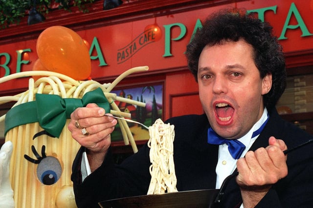 Martin Dominique, who sang as Mario Lanza on ITV show Stars In Their Eyes, entertained onlookers with a few popular Italian songs before officially opening new Italian restaurant 'Bella Pasta' on Briggate. Martin samples a taste of Italian cooking after his work.