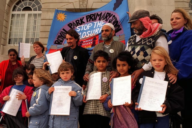 Parents and children present a petition at Leeds Civic Hall to protest over the school's proposed closure in September 1997.