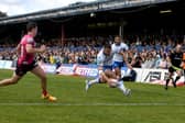 Last stand: Wakefield Trinity's Max Jowitt scores a try in front of the East Stand at Belle Vue - the final match before demolition of the structure began. Picture James Hardisty