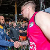 Alex Mellor, right, shakes hands with then Rhinos interim-coach Jamie Jones-Buchanan after Leeds' loss to Tigers at the Jungle in April. Picture by Allan McKenzie/SWpix.com.