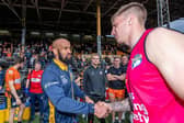 Alex Mellor, right, shakes hands with then Rhinos interim-coach Jamie Jones-Buchanan after Leeds' loss to Tigers at the Jungle in April. Picture by Allan McKenzie/SWpix.com.
