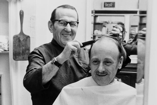 This is Street Lane barber Barney Siddal pictured in November 1972. He is with customer of 18 years Leslie Harris.