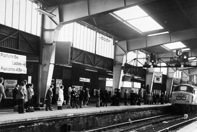 Passengers awaiting their train on one of the platforms at Leeds City Station in May 1972.