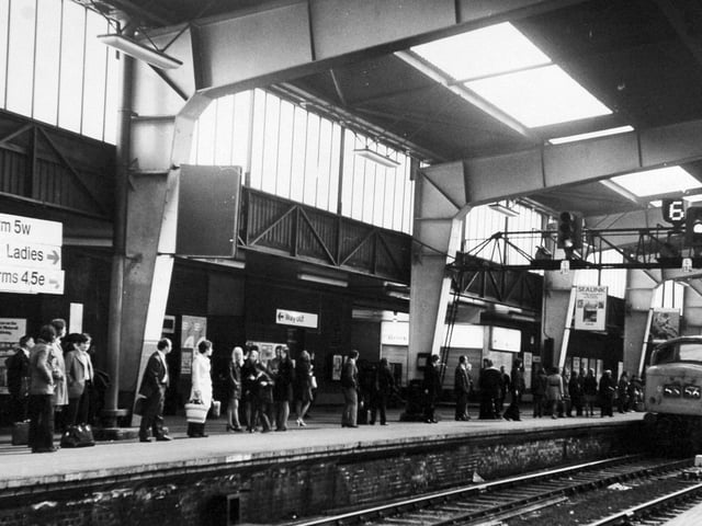 Passengers awaiting their train on one of the platforms at Leeds City Station in May 1972.