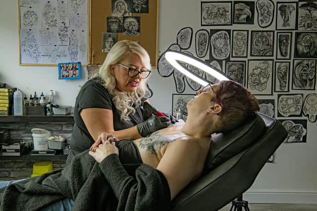 In Leeds, tattoo artists Kate Challinor and Louis Santos are using their skills to restore confidence in those with scars and help people be more accepting of their own bodies. Credit: Tony Johnson