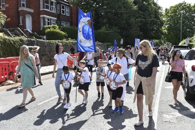 Schoolchildren enjoy taking part in the parade
