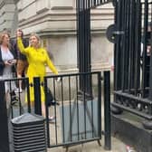 Andrea Jenkyns, Conservative MP for Morley and Outwood, making an obscene gesture to crowds outside Downing Street (Photo: Alex Clewlow)
