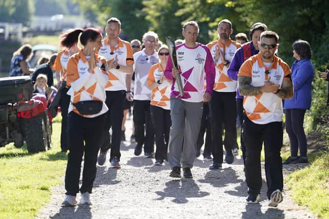 The Queen's Baton, which is coming to Leeds tomorrow, is pictured near to the town of Devizes in Wiltshire (Photo: Andrew Matthews/PA Wire)