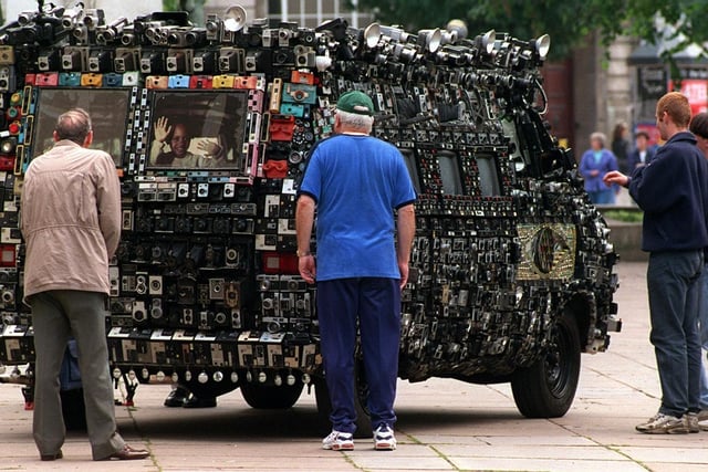 This customised '72 dodge van covered with more than 2,000 cameras proved a talking point among passers-by in Leeds city centre.