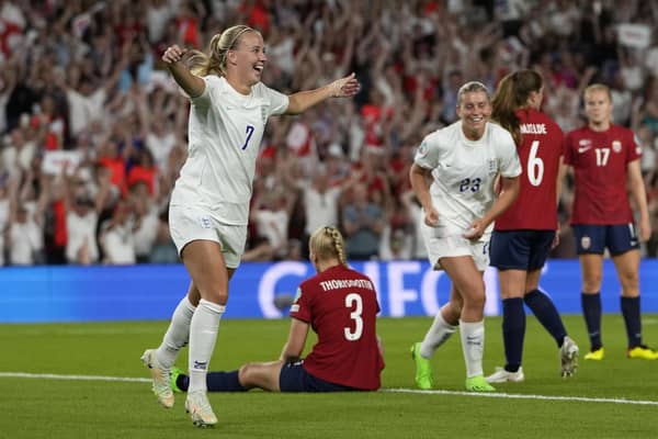 England's Beth Mead celebrates after scoring her third goal, England's 8th. (AP Photo/Alessandra Tarantino)