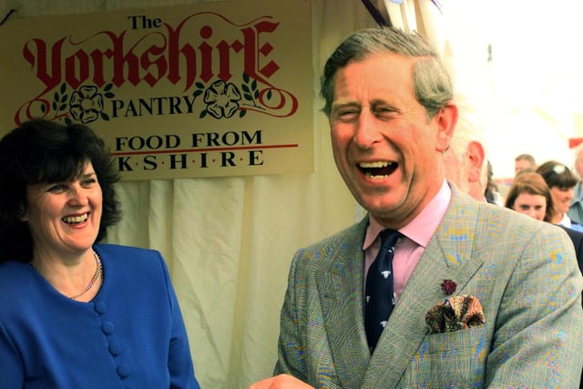 HRH The Prince of Wales enjoying some Yorkshire cheese at the Yorkshire Pantry stand watched by chairman Judy Bell.