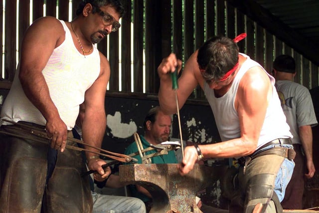 Blacksmiths get to work during one of the many competitions held at the Great Yorkshire Show in July 1998.