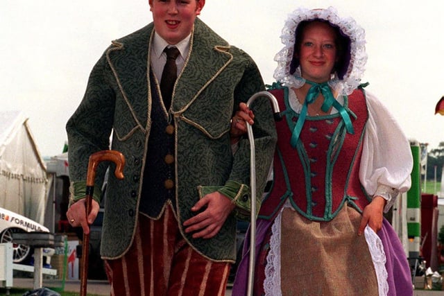 Duncan Burnett and Leah Taylor parade their wool carpet material outfits designed by Katie Ellerbeck. They were part of a fashion show given by students of the Bradford and Ilkley Community College in July 1997.
