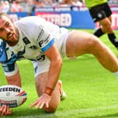 Toulouse's Joe Bretherton celebrates scoring his side's first try against Wakefield Trinity at Magic Weekend. Picture: Will Palmer/SWpix.com.