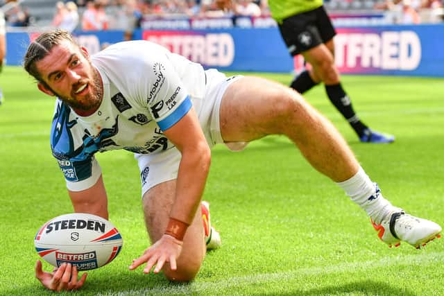 Toulouse's Joe Bretherton celebrates scoring his side's first try against Wakefield Trinity at Magic Weekend. Picture: Will Palmer/SWpix.com.