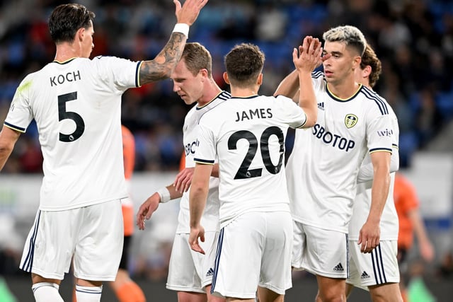 James is congratulated as Leeds celebrate going 1-0 up.