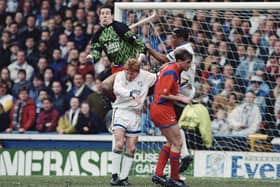 FUTURE AND PRESENT: Eventual Leeds United 'keeper Nigel Martyn towers above Leeds United's Gordon Strachan for Crystal Palace in the First Division clash between the Whites and Eagles of January 1992. Picture by Varleys.